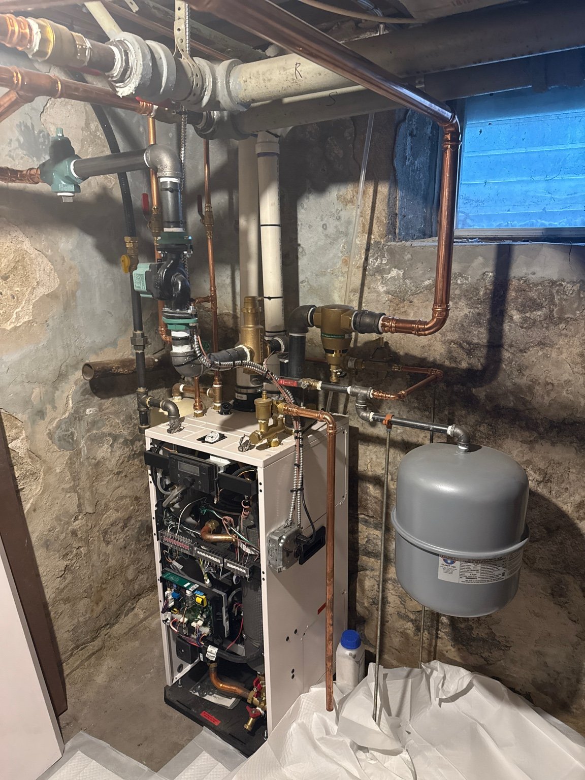 High-efficiency boiler system during professional service and setup installed by TrueField Home Services in Delaware County, PA