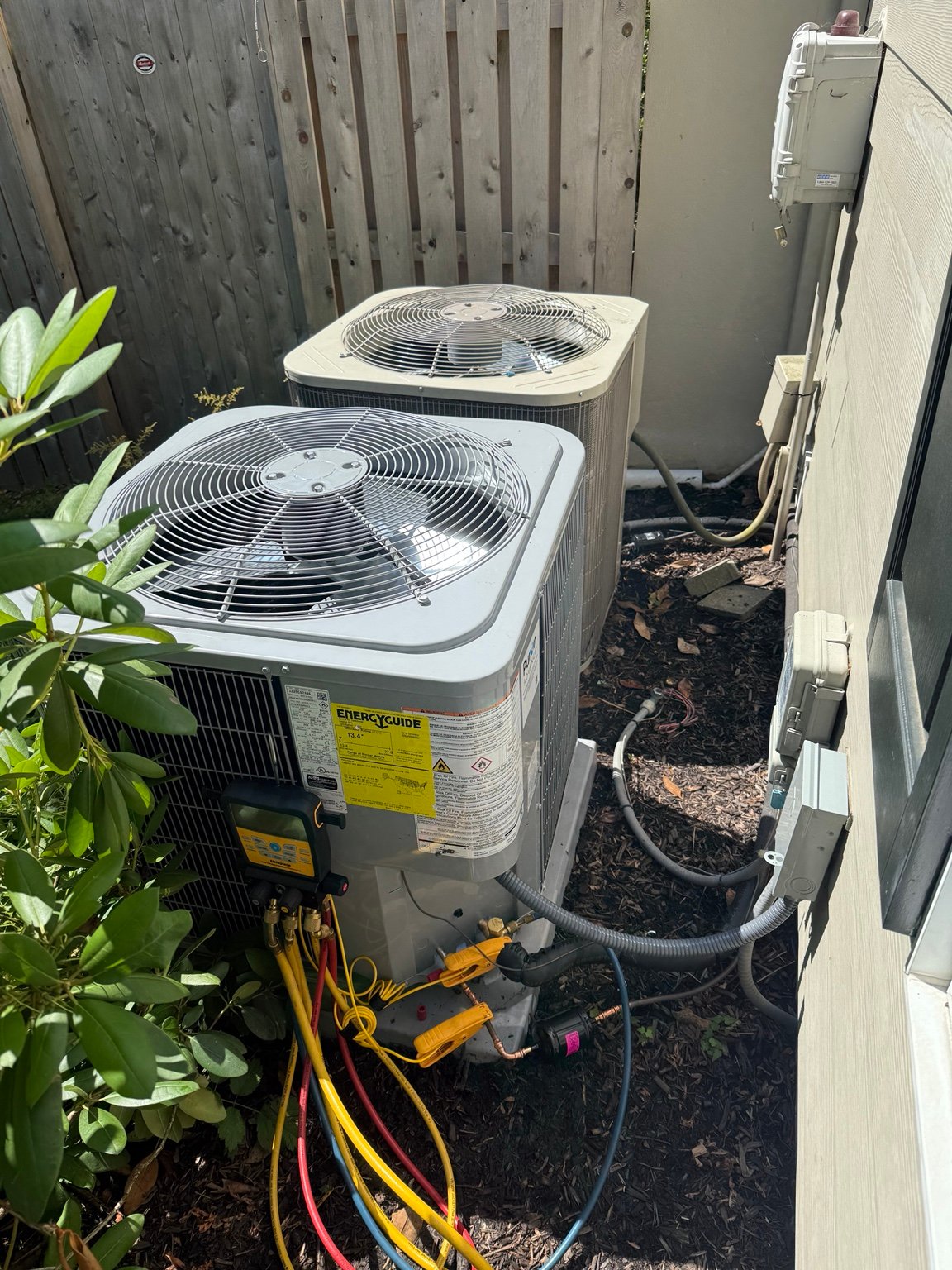 Air-conditioning condenser during final testing and commissioning by TrueField Home Services in Delaware County, PA