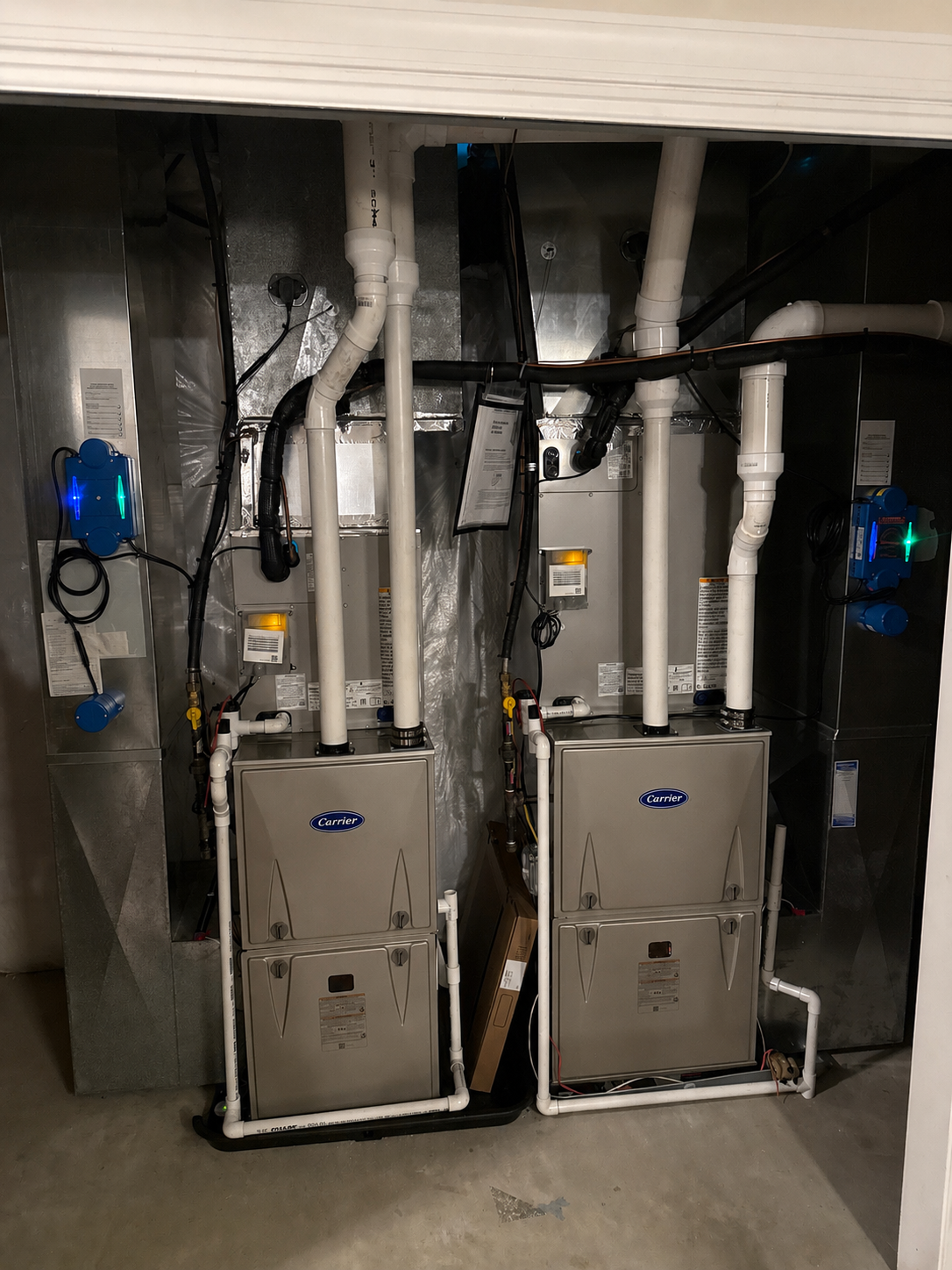 Two Carrier gas furnaces with evaporator coils installed by TrueField Home Services in Delaware County, PA