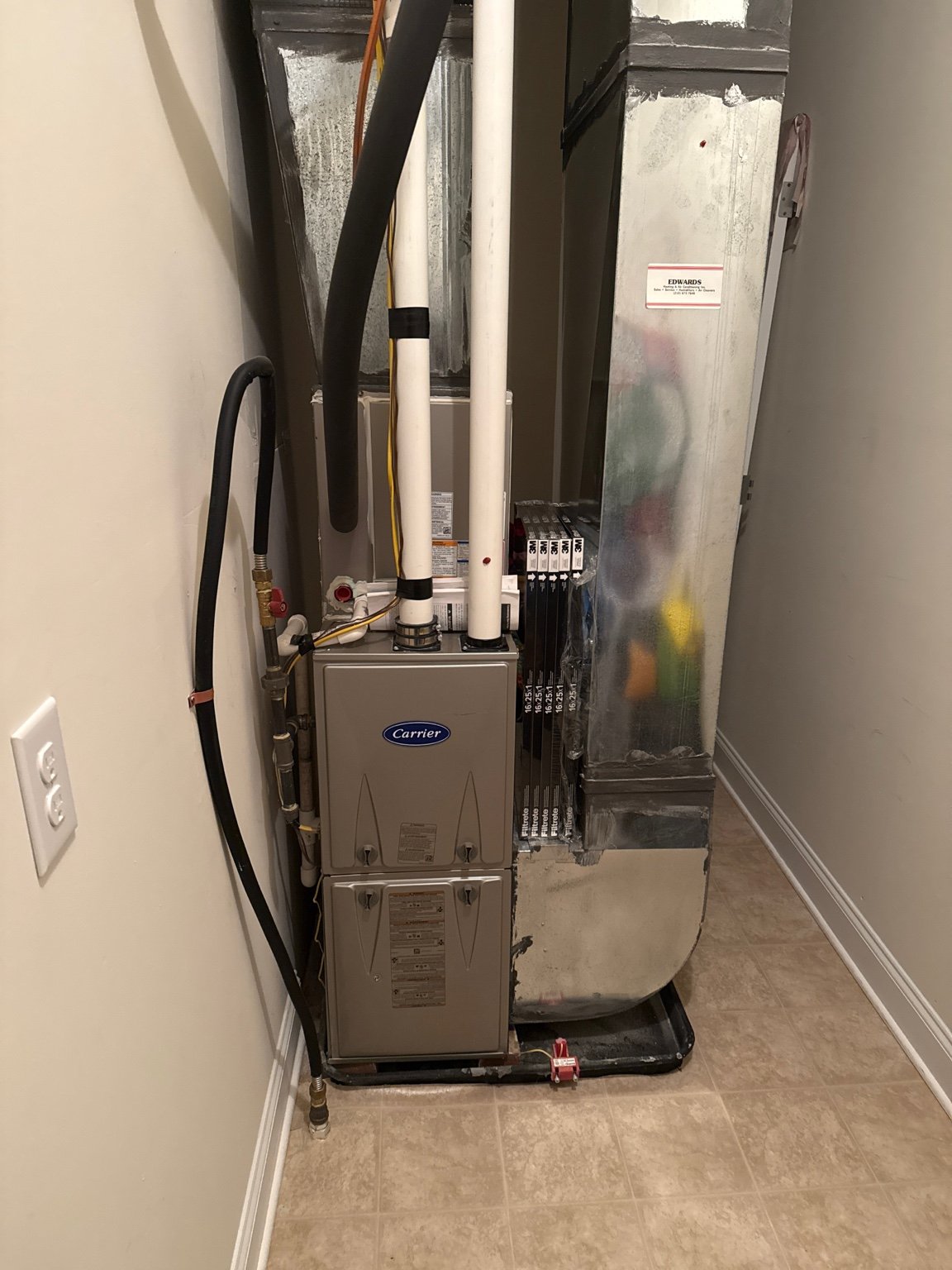 High-efficiency furnace with air-conditioning coil installed by TrueField Home Services in Delaware County, PA